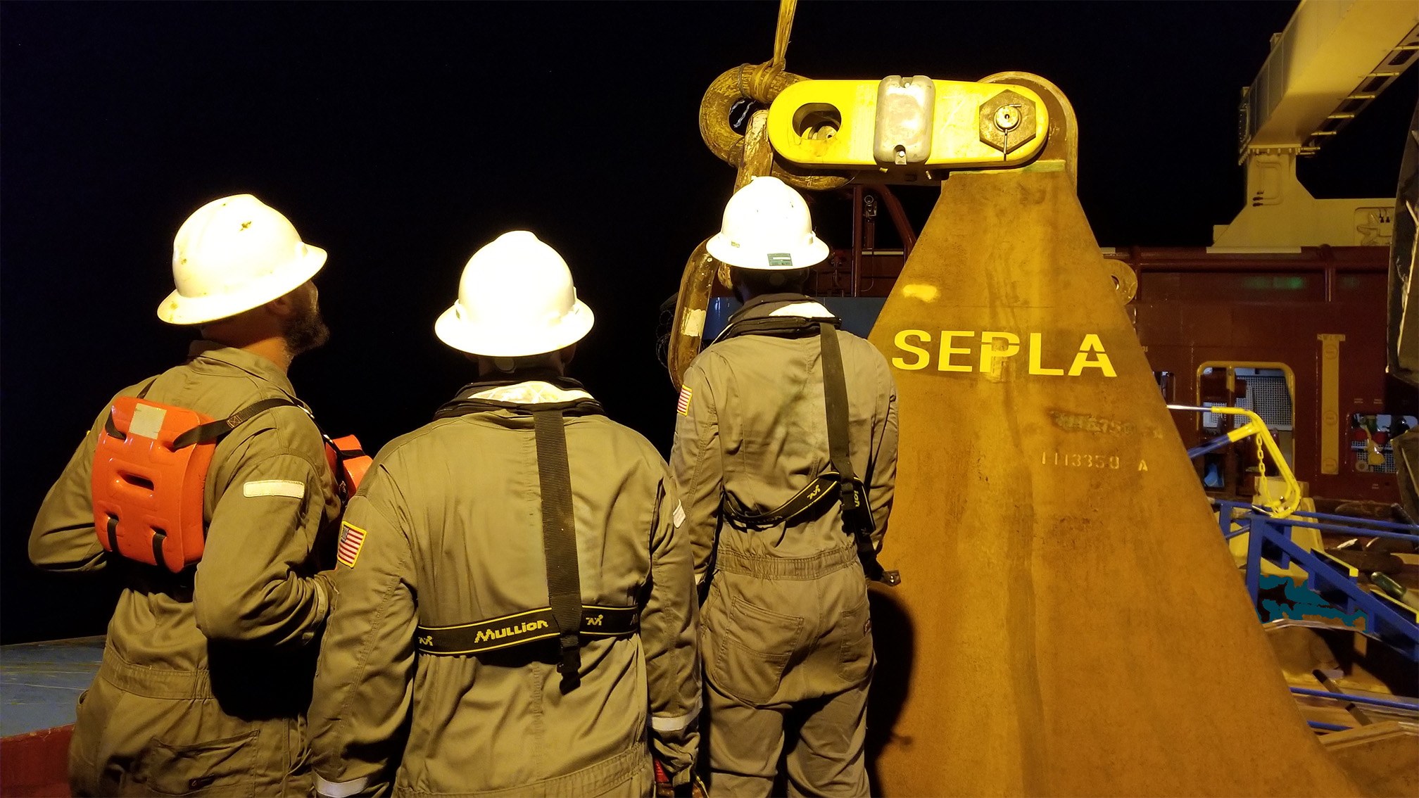 3 men offshore near a SEPLA anchor
