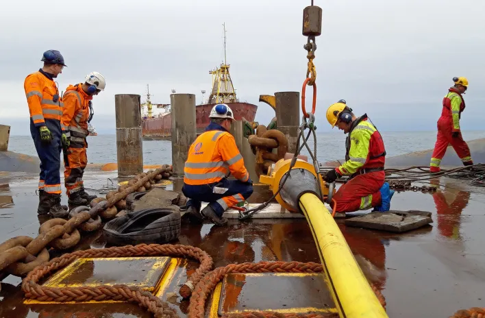Offshore crew installing permanent mooring 