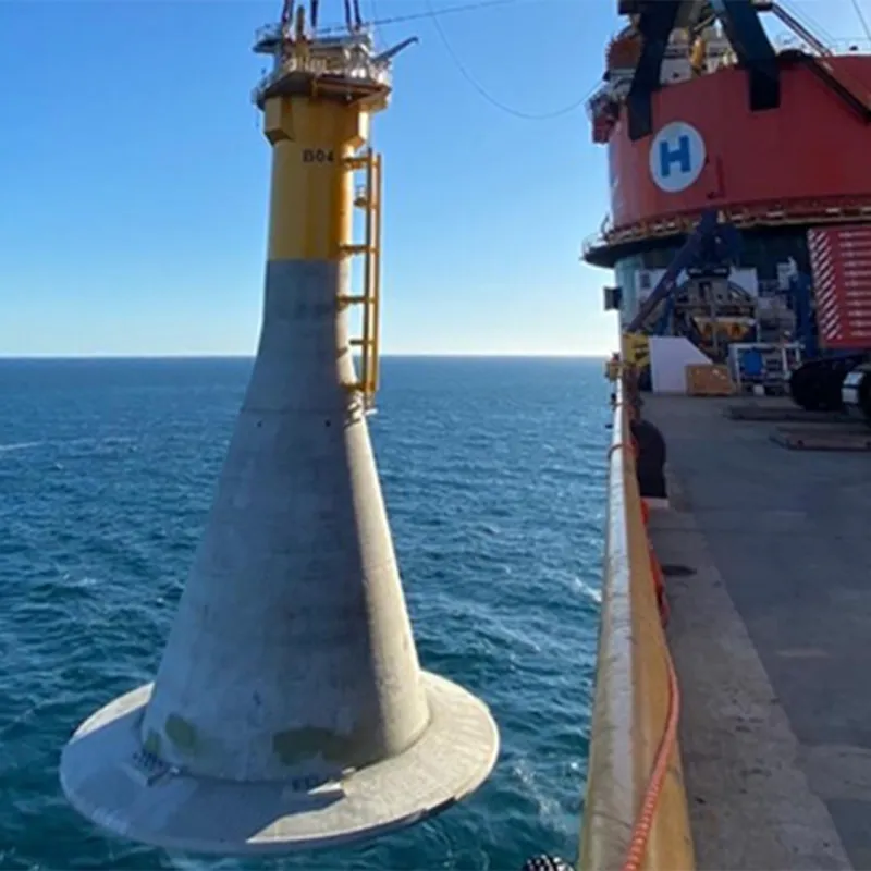 Wind turbines installed on concrete Gravity Based Structures (GBS) for the Fécamp wind farm project located off the coast of Northern France.
