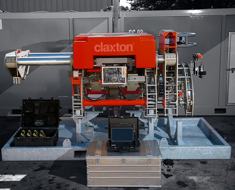 Pipeline coating removal tool with Claxton branding