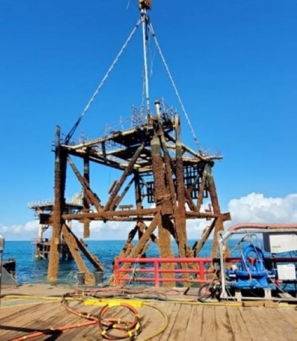 Large metal structure removed from sea